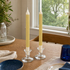 Chartreuse striped taper candles styled on a Portland dining table - Whats New Furniture