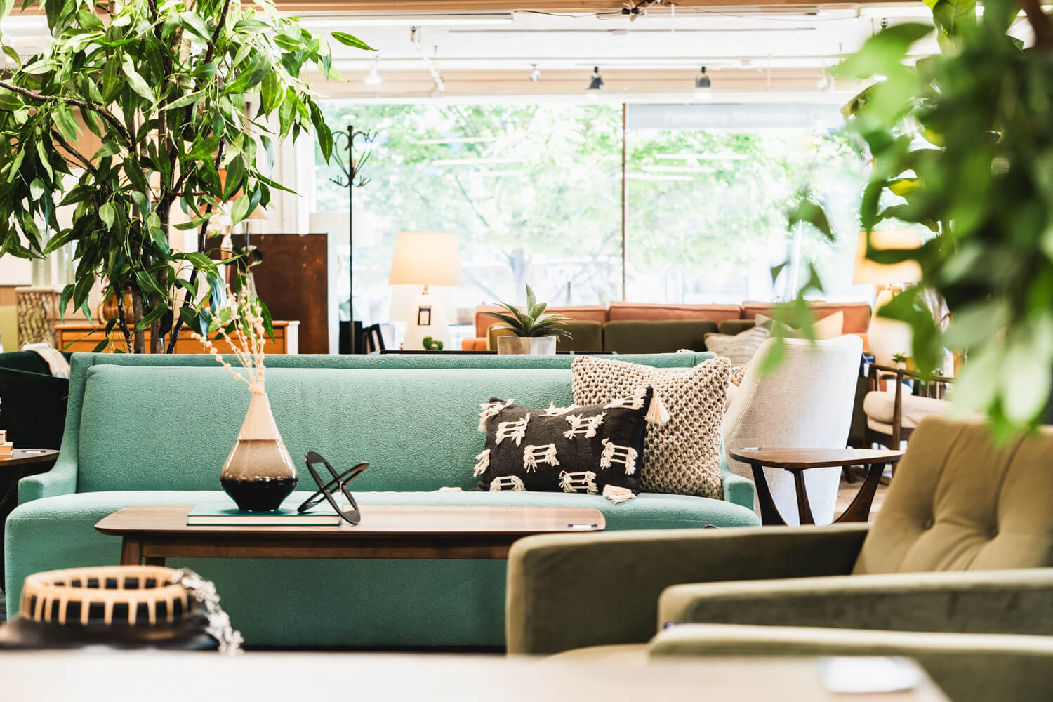 Mid-century modern Stylus sofa at What’s New Furniture in Portland, featuring sleek design and plush comfort.