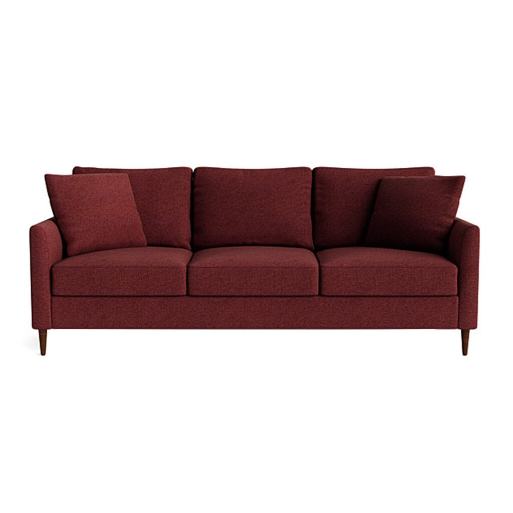 A red Josie sofa with a streamlined design and plush comfort, featuring a warm Serenity Cinnamon fabric.