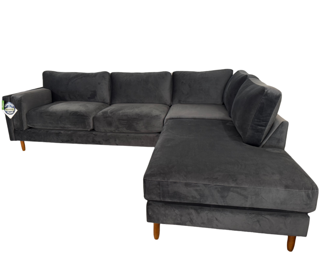 Timber sectional with right-facing chaise showing clean, contemporary lines