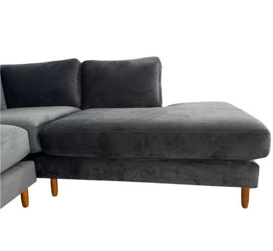 Side profile of the Timber sectional highlighting its structure and open chaise design