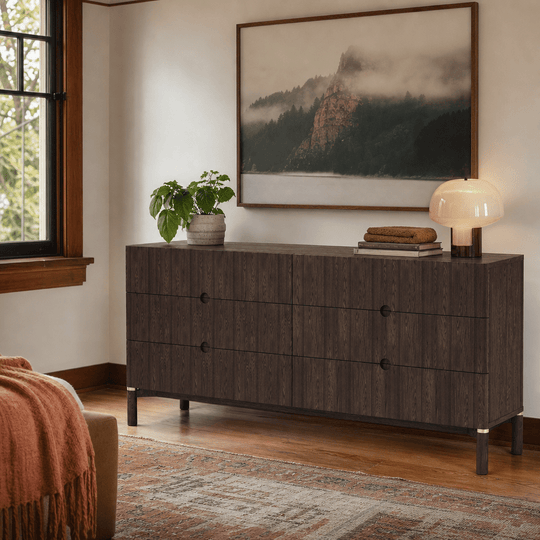 Arun double dresser in espresso oak styled in a Portland bedroom with PNW landscape art, brass lamp, and vintage rug - Whats New Furniture