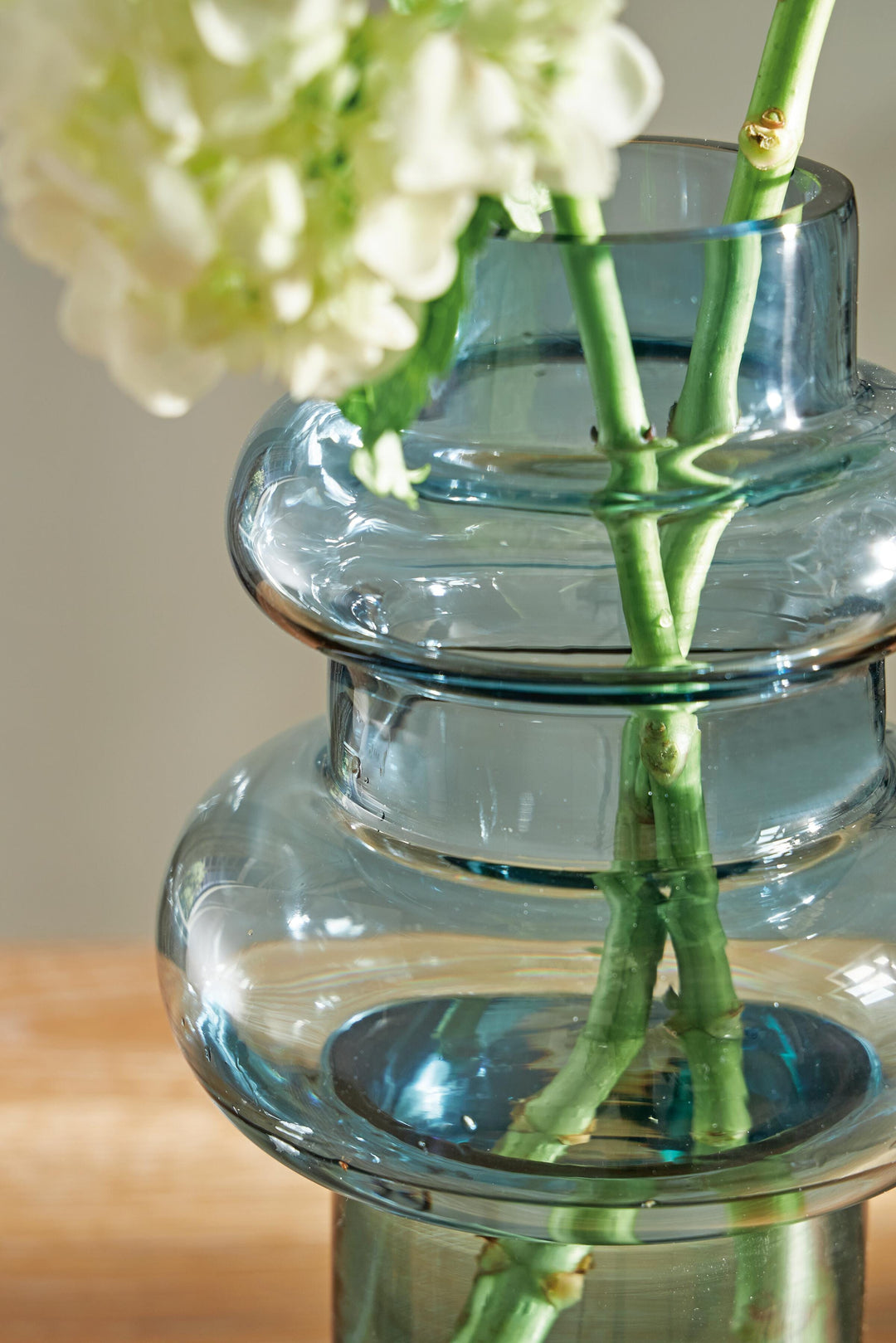 Vallmen 10-Inch Vase in Blue — Ashley Furniture detail view