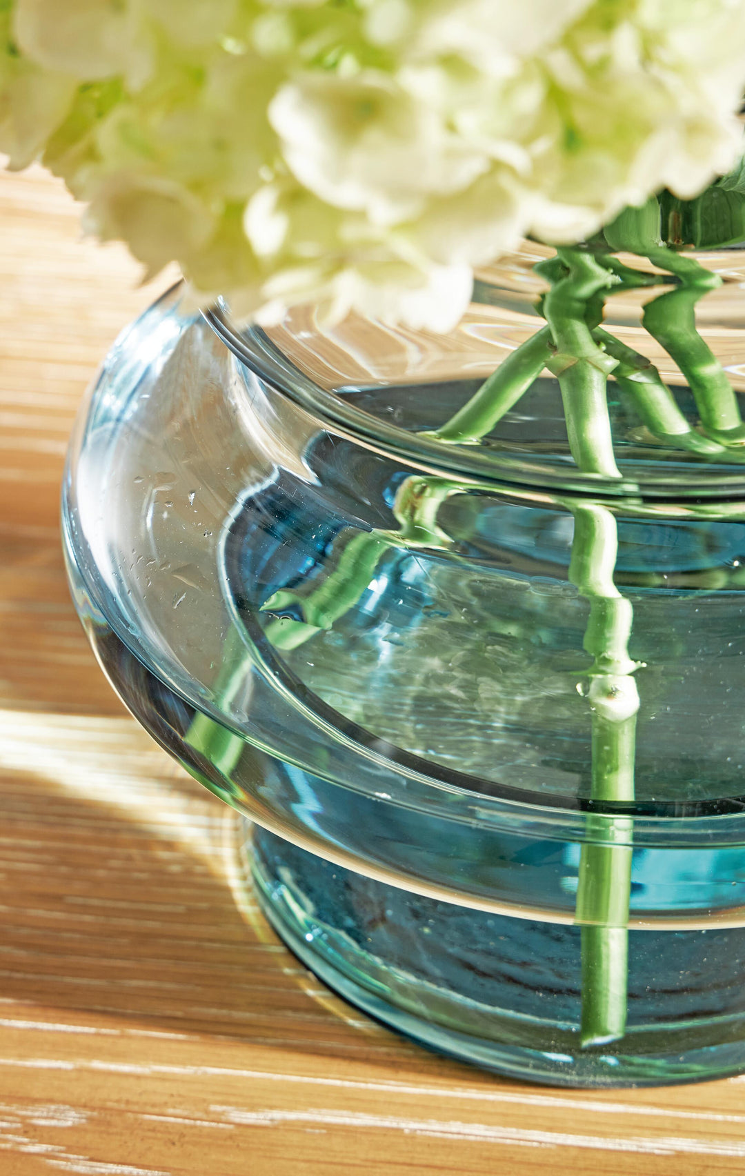 Vallmen 8-Inch Vase in Blue — Ashley Furniture detail view