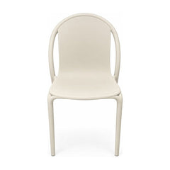 Beige dining chair with a continuous molded shell by Vondom