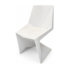 White geometric dining chair with an angular molded shell by VONDOM