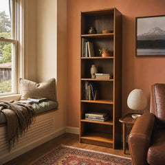 Walnut mid-century bookcase with tall slim frame and warm wood grain - view 2
