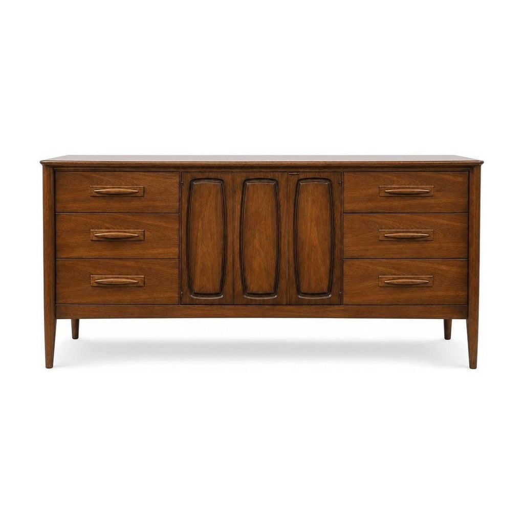 Walnut mid-century dresser with six flush drawers and a long low Broyhill case.