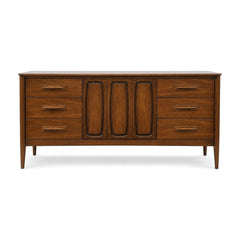 Walnut mid-century dresser with six flush drawers and a long low Broyhill case.