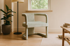Knowles curved moss green barrel accent chair styled in a Pacific Northwest living room — What&