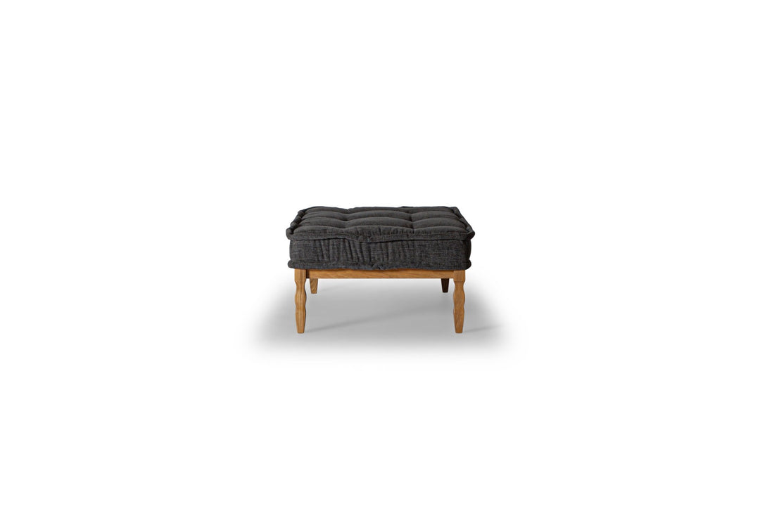 Lewis Fabric-Top Coffee Table in anthracite tufted top on wood frame — side view — What&
