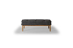 Lewis Fabric-Top Coffee Table in anthracite tufted top on wood frame — front view — What&