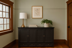 Murphy cabinet bed in New Traditions Black styled closed as a console in a bright Portland mid-century modern room - Whats New Furniture
