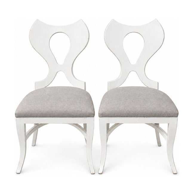 White dining chairs sold as a matching set of two with clean contemporary lines.