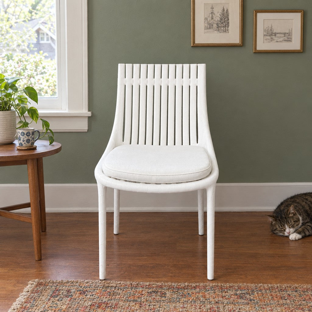White contemporary Ibiza chair with a rounded molded shell by Vondom - detail view 1