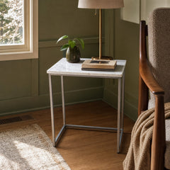 White marble pedestal end table with a sculptural base and veined stone top - view 2