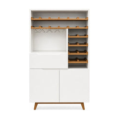White mid-century Article bar cabinet with a tall slim silhouette and paneled doors.