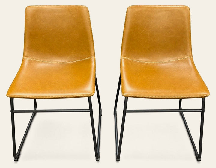 Tan mid-century dining chair with a sculpted solid-wood frame and tapered legs - Whats New Furniture Portland OR