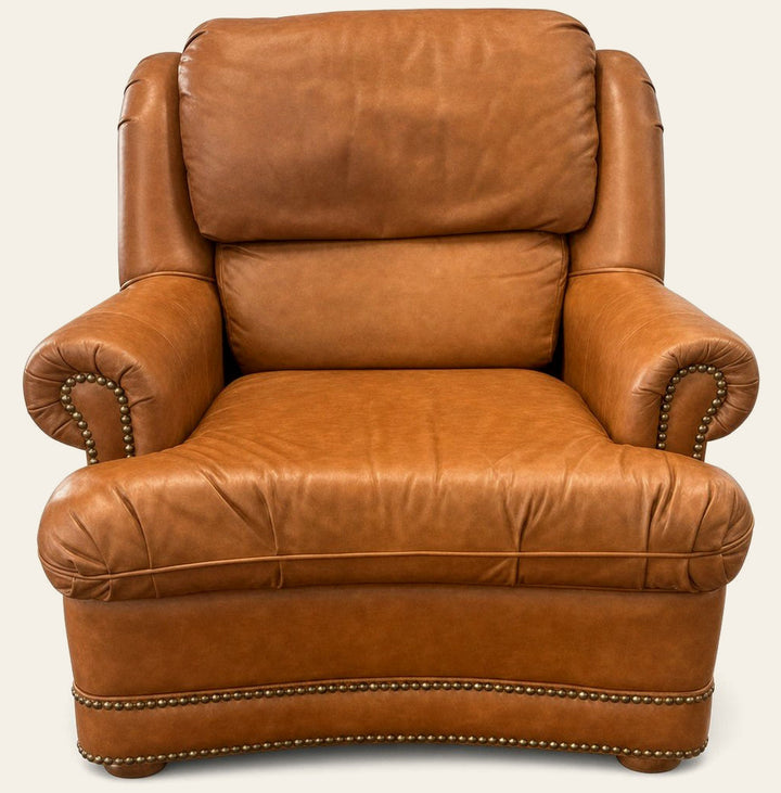 Cognac brown leather mid-century lounge armchair with a solid wood frame and low-slung - Whats New Furniture Portland OR