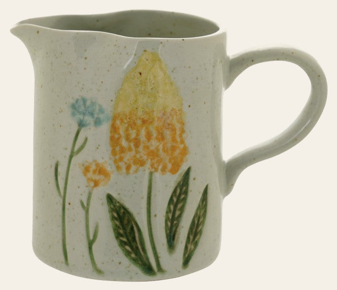 Hand-painted stoneware creamer with a yellow tulip and blue wildflowers - Whats New Furniture Portland OR