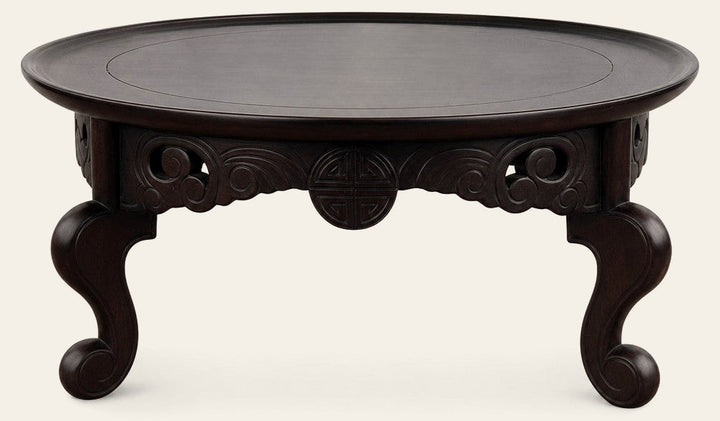 Dark walnut carved wood sculpture with a compact sculptural silhouette - Whats New Furniture Portland OR