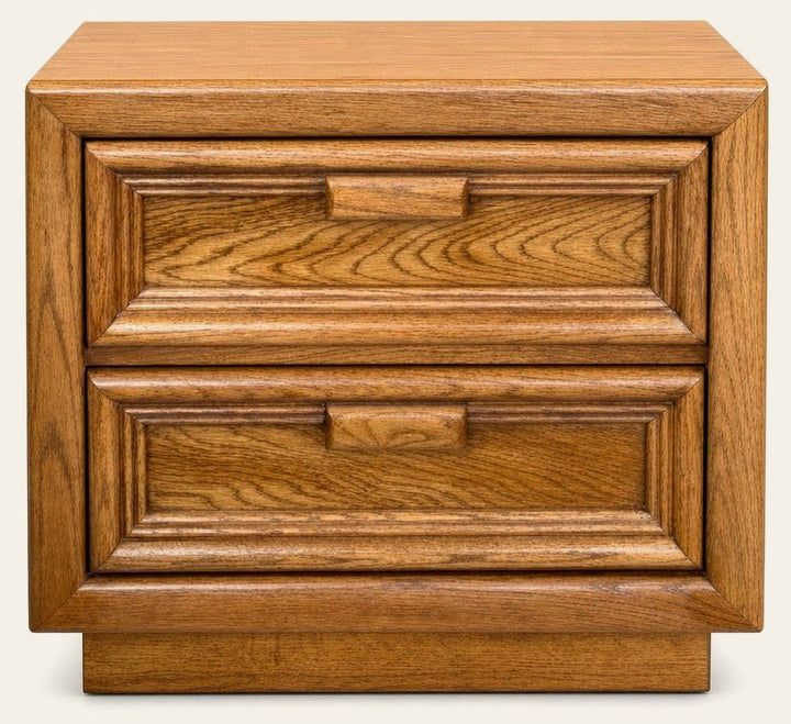 Golden solid walnut nightstand with compact mid-century silhouette and visible grain.