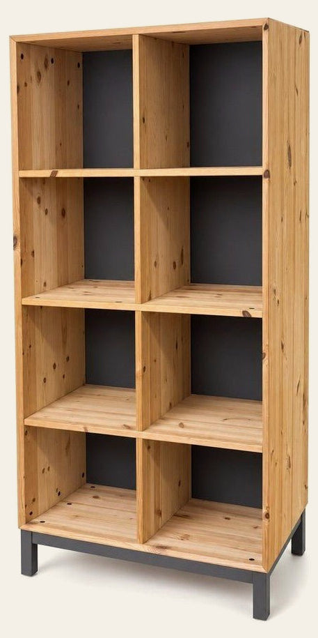 Natural wood bookcase with open shelves and minor damage on the top surface.