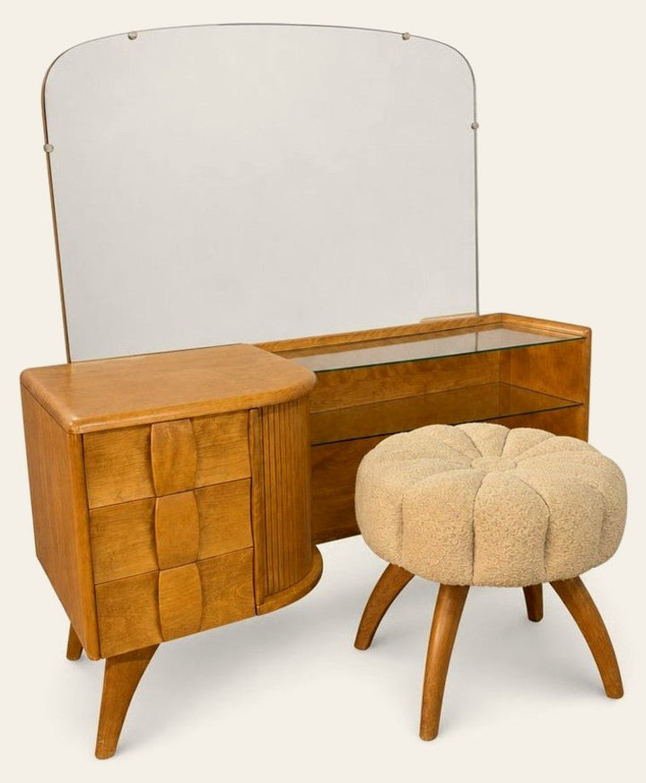 Walnut Heywood Wakefield vanity desk with sliding tambour doors and a worn desktop.