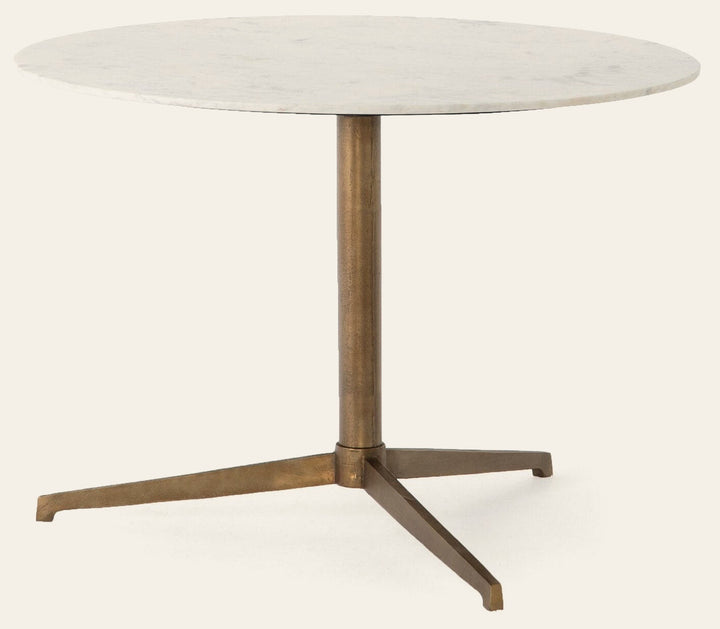 Helen Round Bistro Table in Polished White Marble three-quarter studio view with raw brass tripod base - Whats New Furniture Portland OR