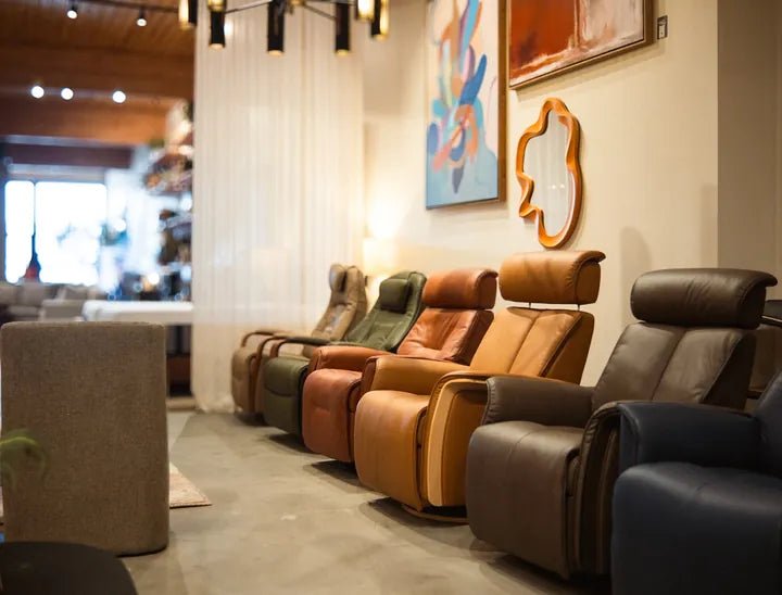 A row of Fjords leather recliners in tan, green, cognac and navy in the Cedar Mill showroom
